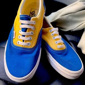 Blue and yellow checkered vans. Worn once. Great condition. Need gone asap.